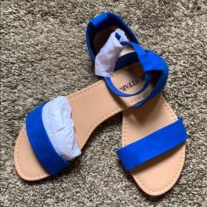 Never worn! Just fab- sandals.